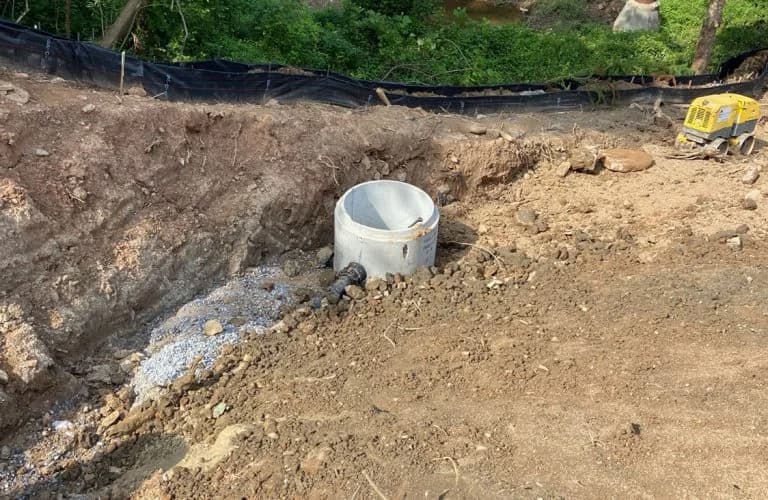 Stormwater drainage installation with erosion control and site preparation services