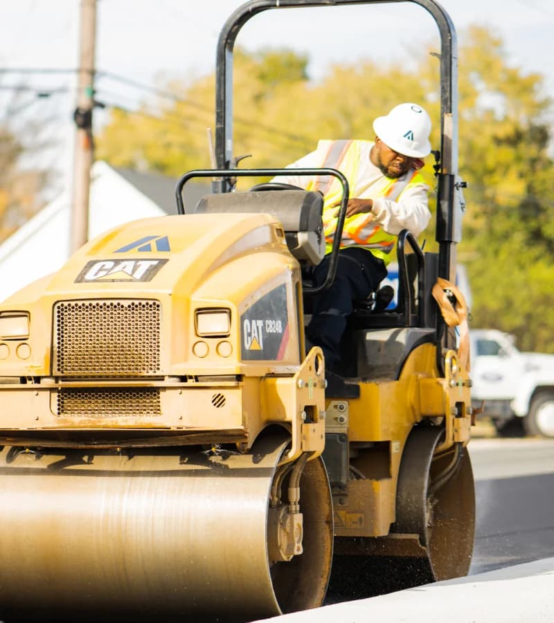 Team member using a roller