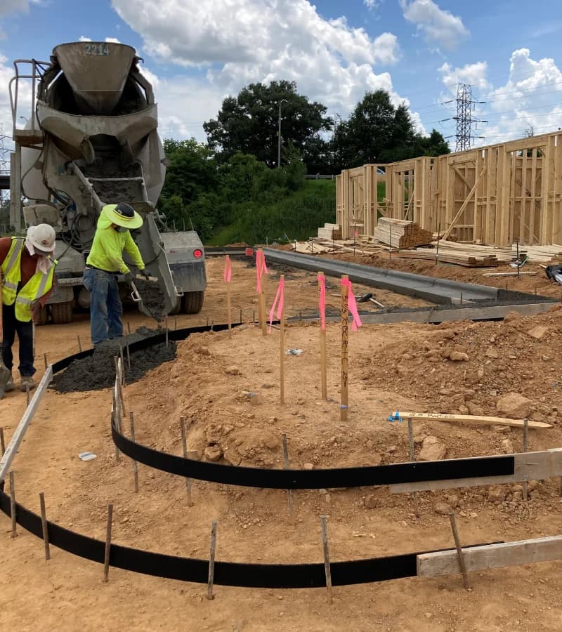 Team working on filling concrete