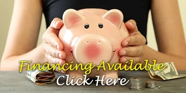A Person puts money into a piggy bank while the photo reads financing available, click here.