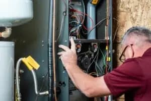 HVAC Technician performing an AC Repair