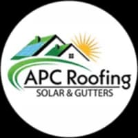 Roofers installing solar panels on a residential roof for energy efficiency and sustainability.