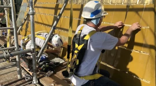 UNG steeple gets a fresh coat of gold after 20 years