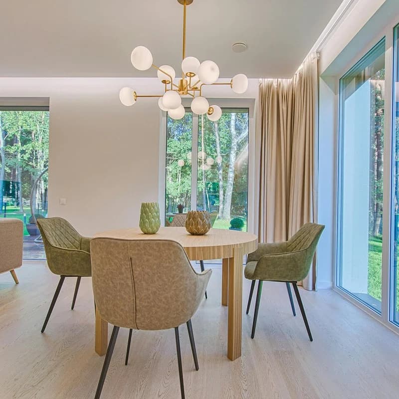 flooring installer combining ceramic and wood flooring in a modern pattern