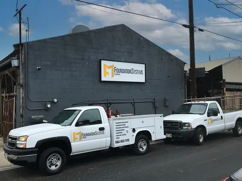 Foundation Systems Hawaii office building and work trucks.