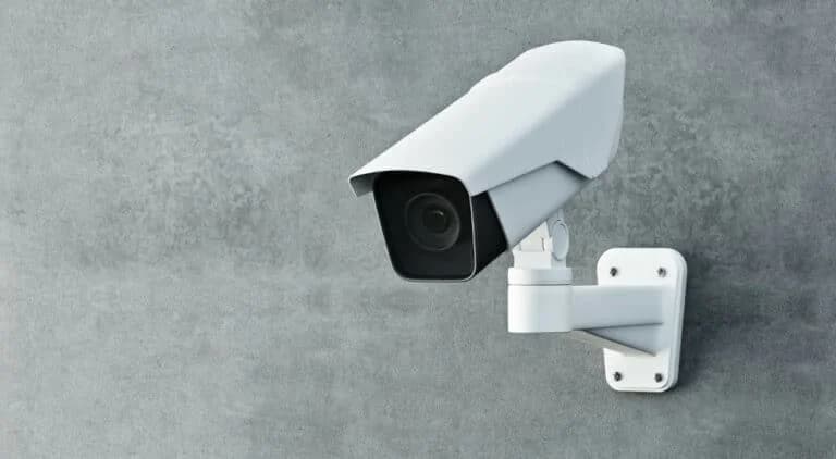 A surveillance camera installed at an entrance to increase security.