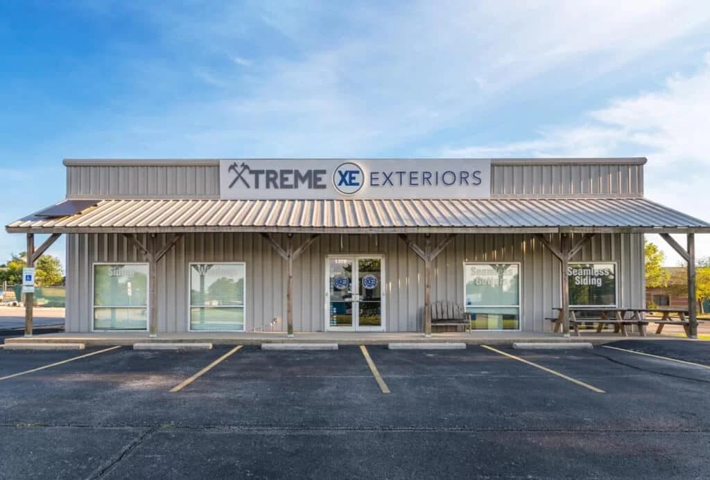 Exterior of the Xtreme Exteriors Shop building and and parking lot