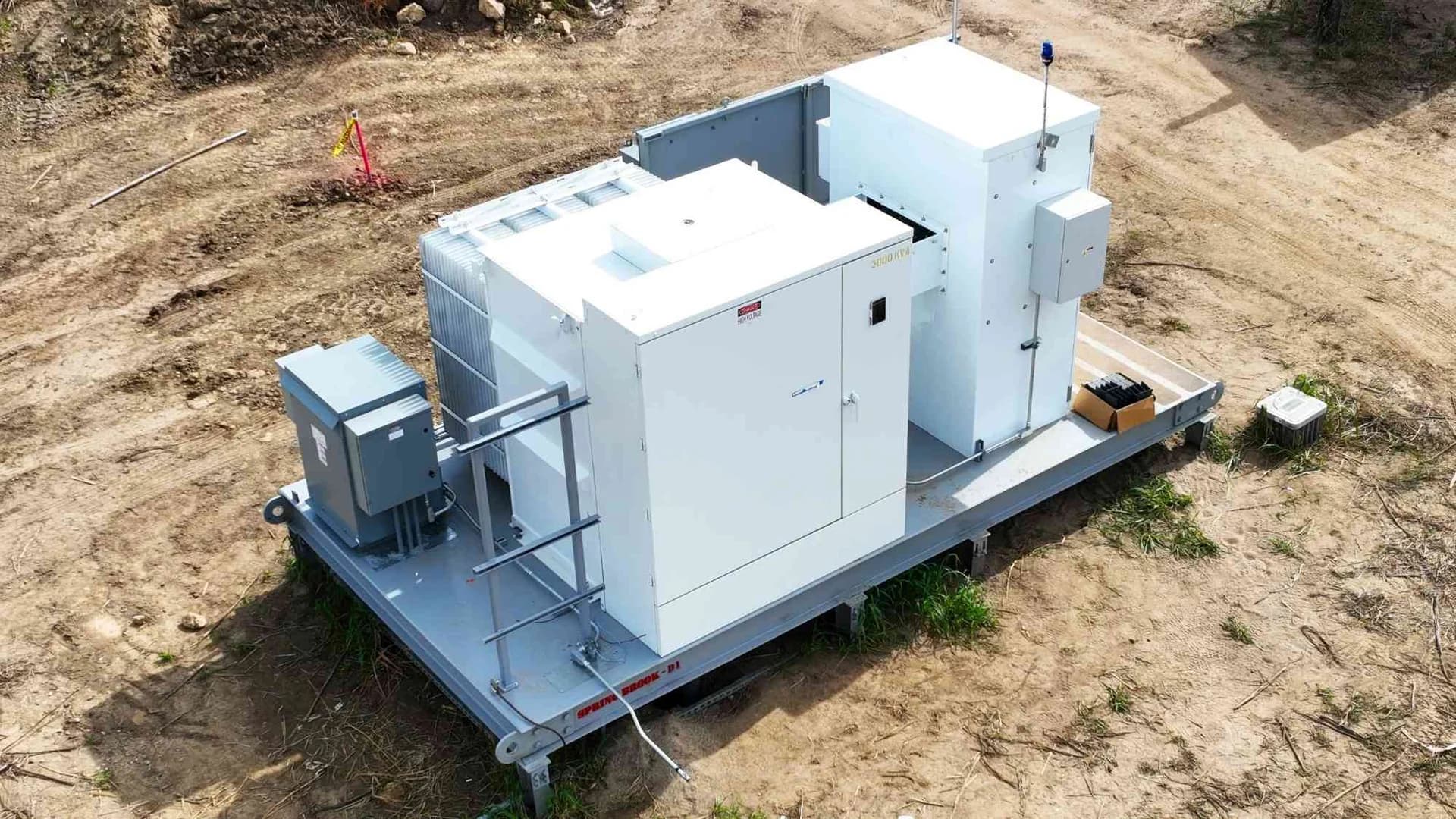 Aerial view of the inverter skid and transformer assembly at the Spring Brook Solar project in Whitewater, Wisconsin.