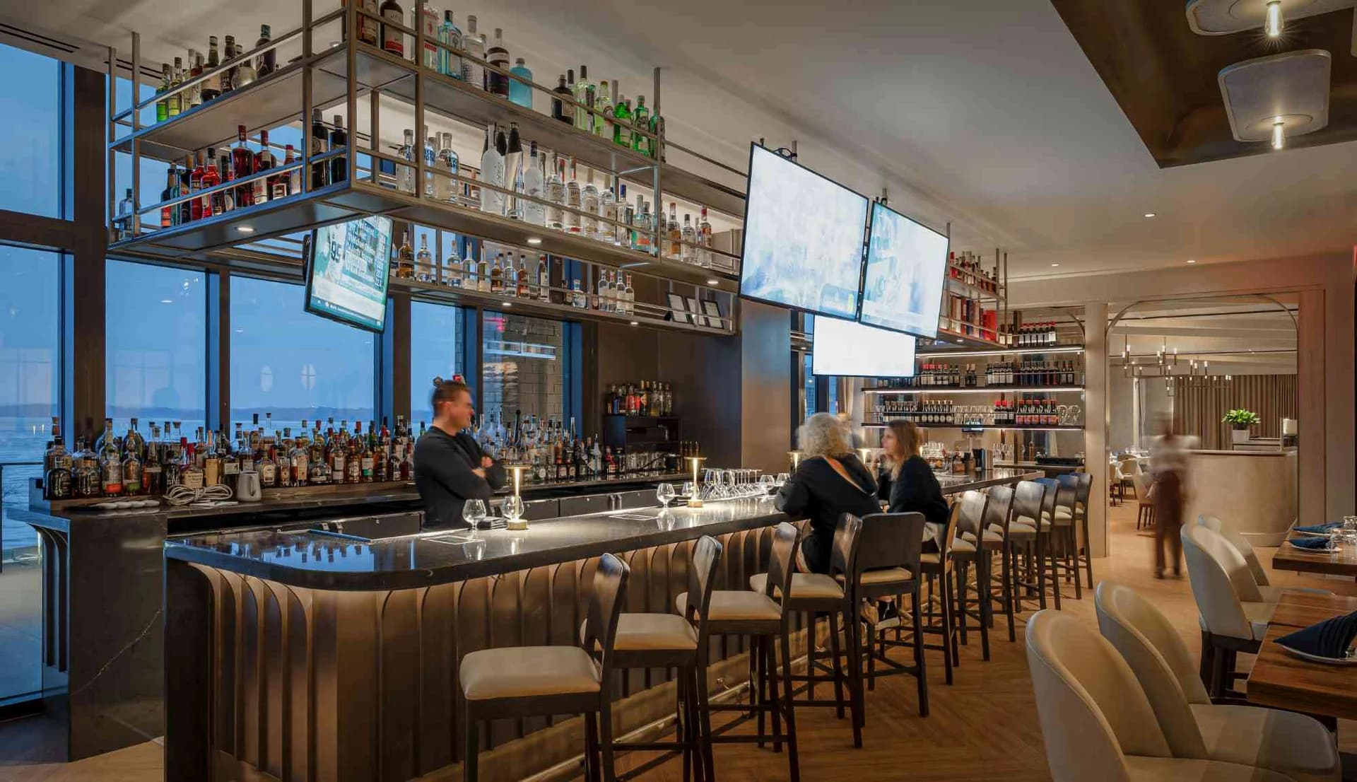 Bar interior at One Social District restaurant inside One09 Apartments in downtown Madison