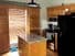 Kitchen cabinet painting job in Lee's Summit Missouri before sanding them down and using Zinsser123 to prime them
