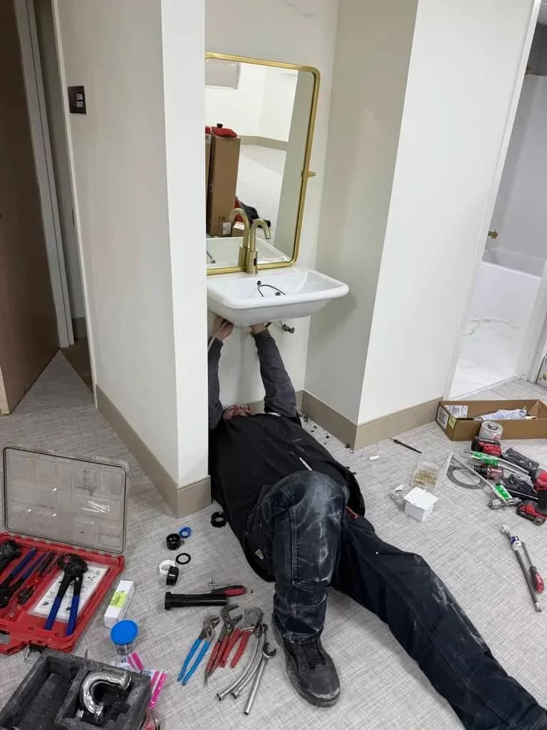 Rocky Mountain Plumbing technician arriving at a home