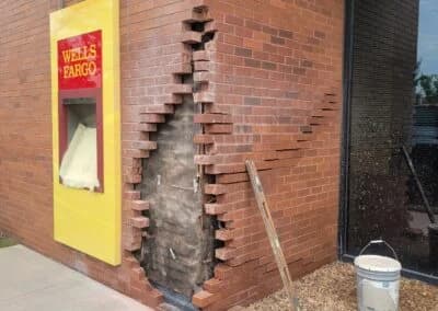 Broken brick wall in need of repair