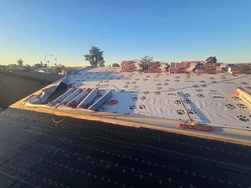 Roofers working on a house