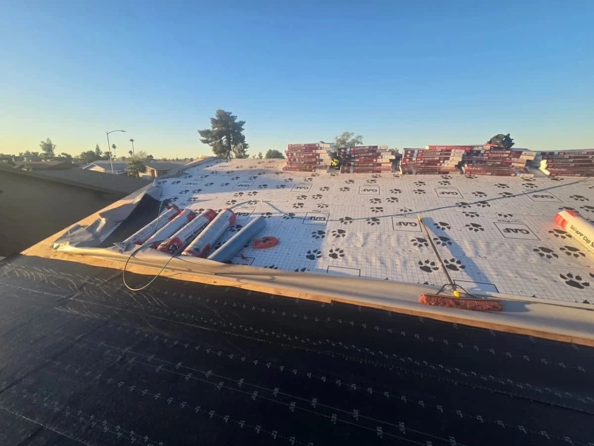 Roofers working on a house