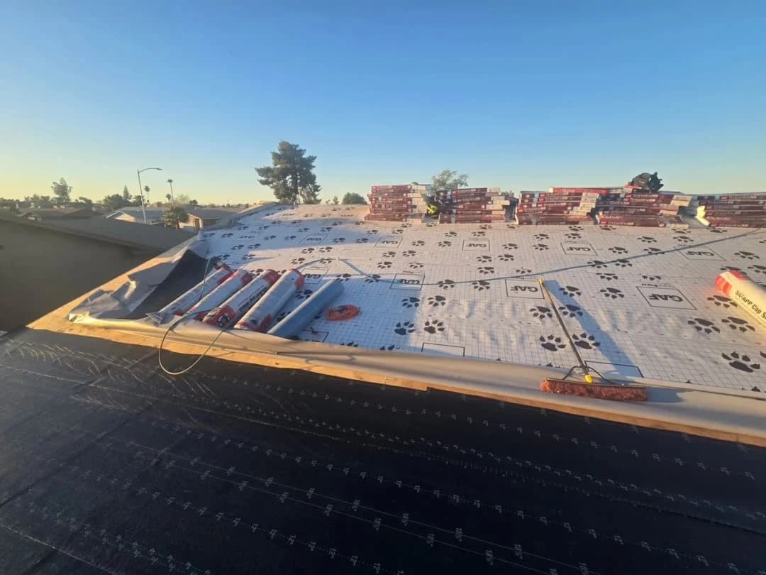 Roofers working on a house