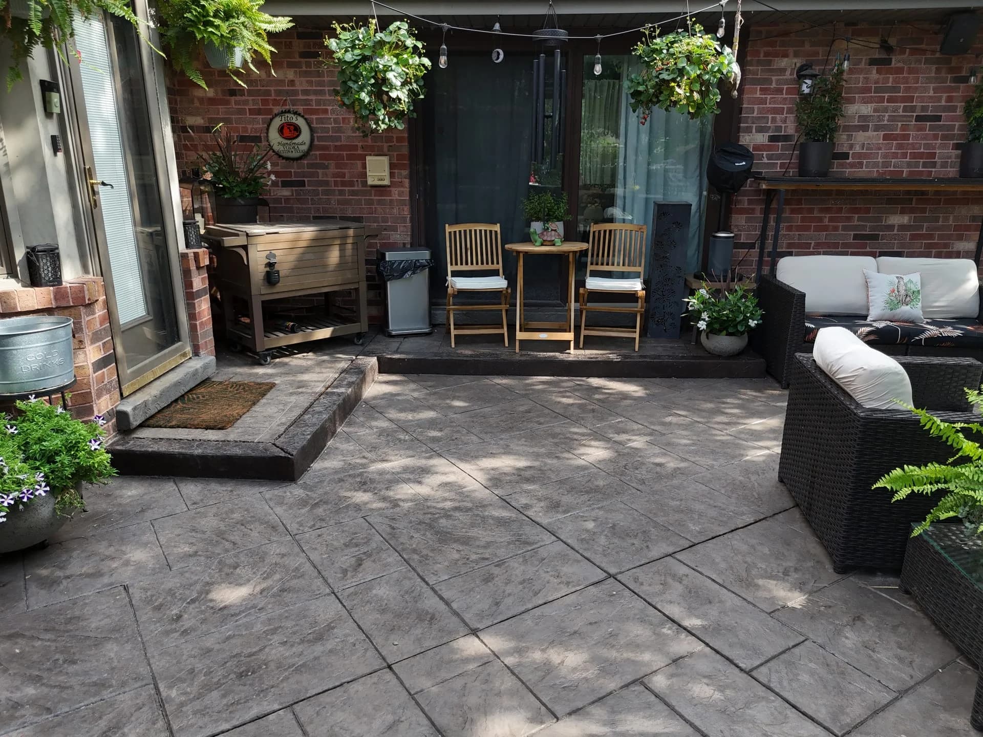 Stamped concrete patio in backyard setting