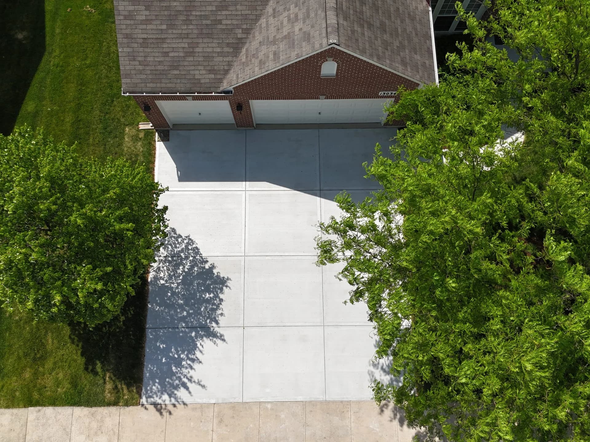 Concrete driveway aerial drone view