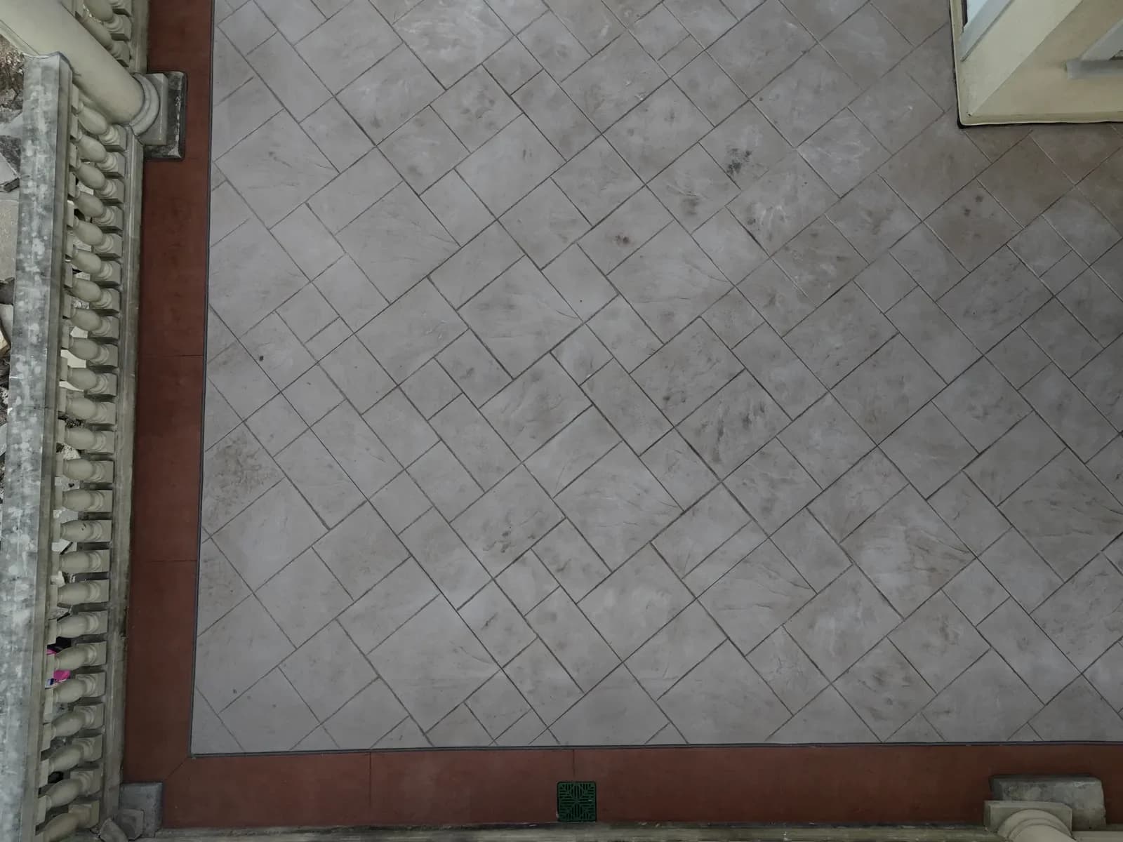 Stamped veranda herringbone pattern with terracotta border detail