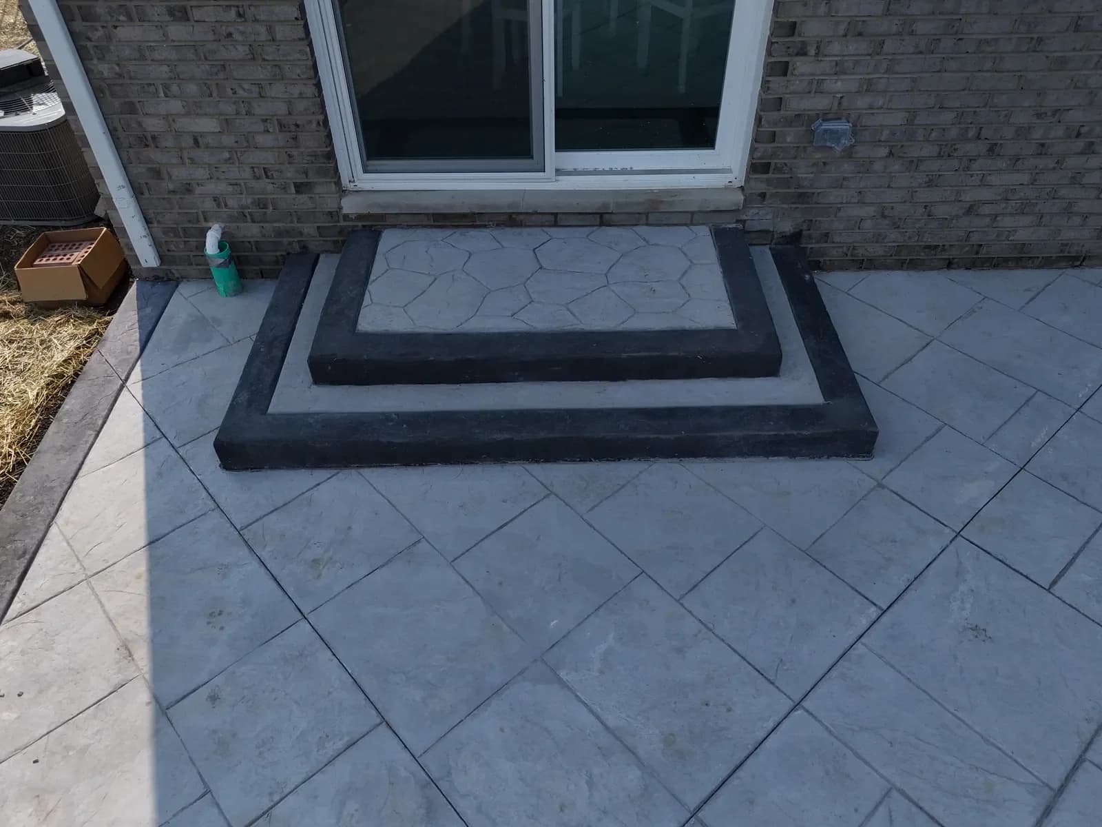 Stamped patio two-tier stepped door landing detail