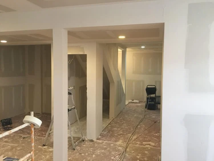 picture of drywall being put up in a saint paul home with texturing and taping