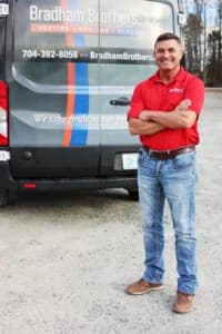 standing in front of van