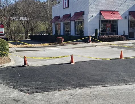 Atlanta Concrete installed this ADA parking area and ramp for this Kentucky Fried Chicken location on Cascade Road.