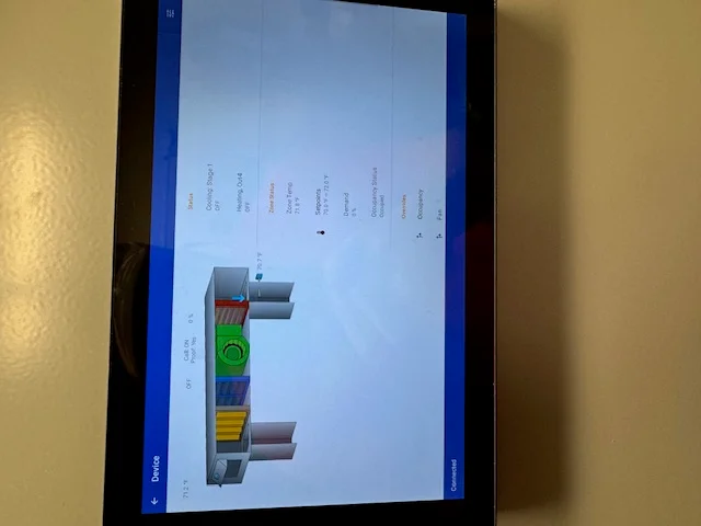 HVAC controls touchscreen dashboard mounted inside a building