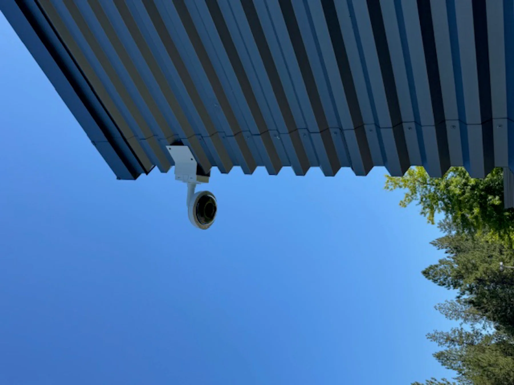 Wall-mounted surveillance camera installation at Holy Family Catholic School