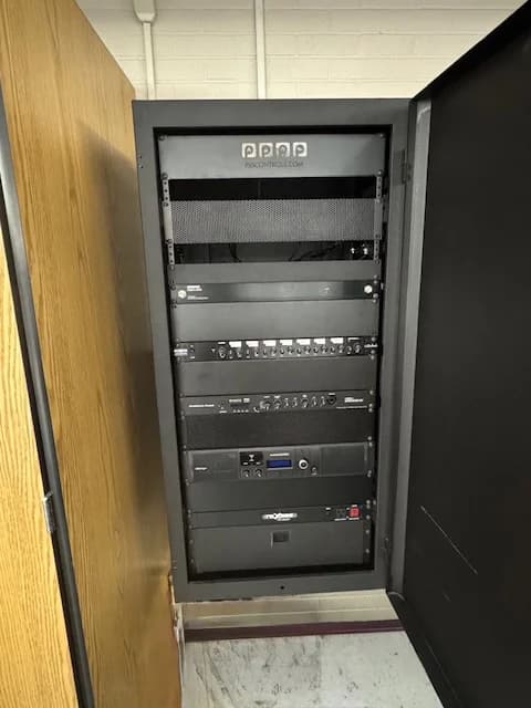 AV equipment rack and low voltage installation in progress