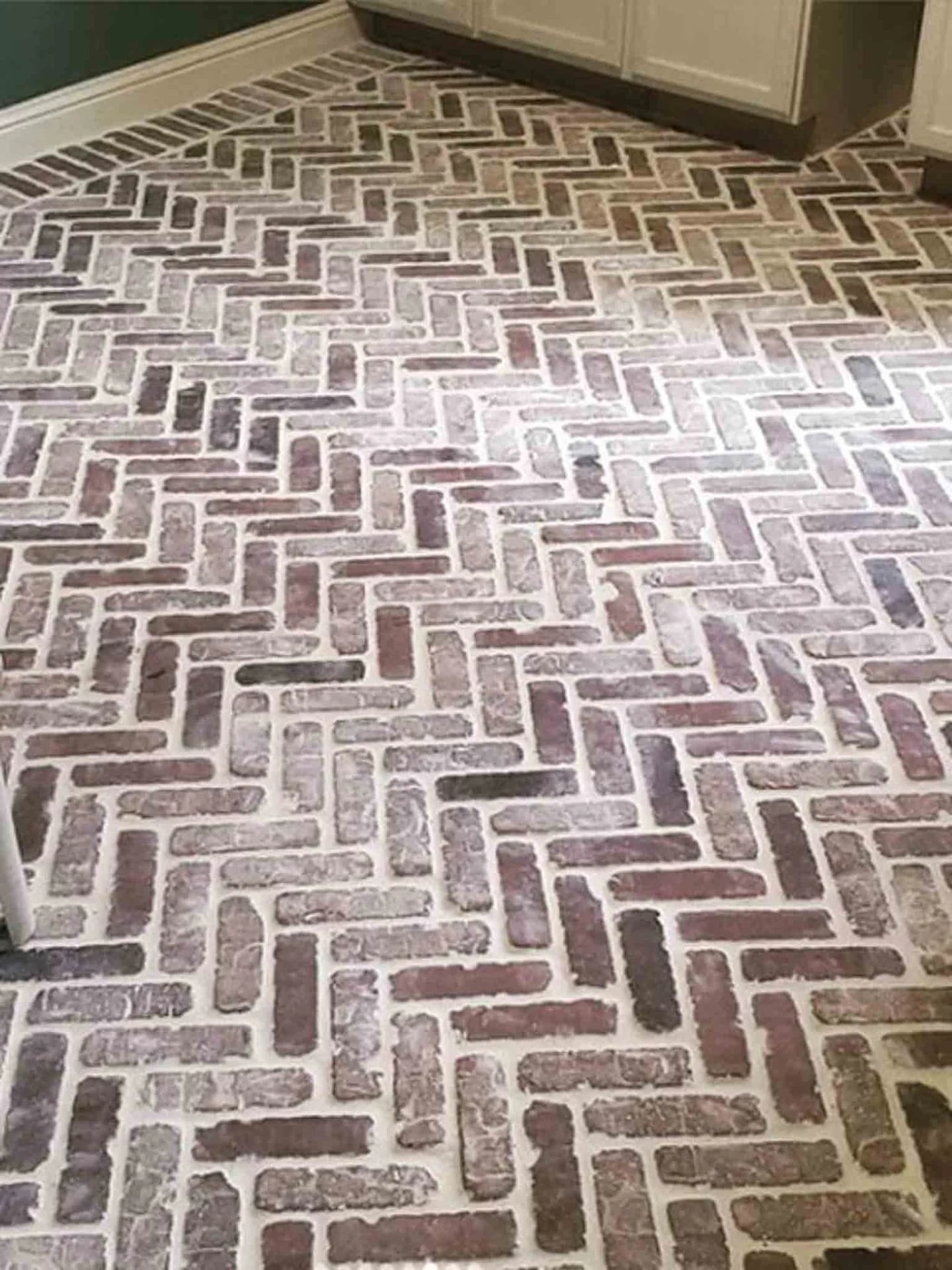 Footprints Floors brown tile installed on a porch.