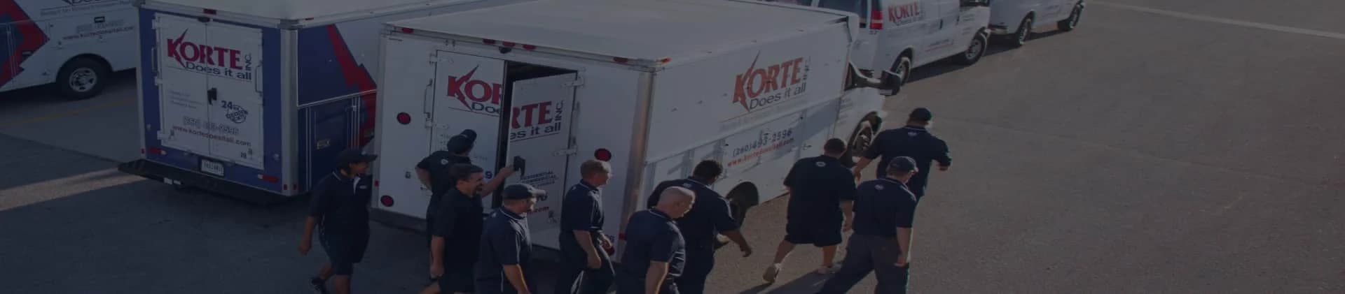 Korte Does It All banner image with trucks and employees
