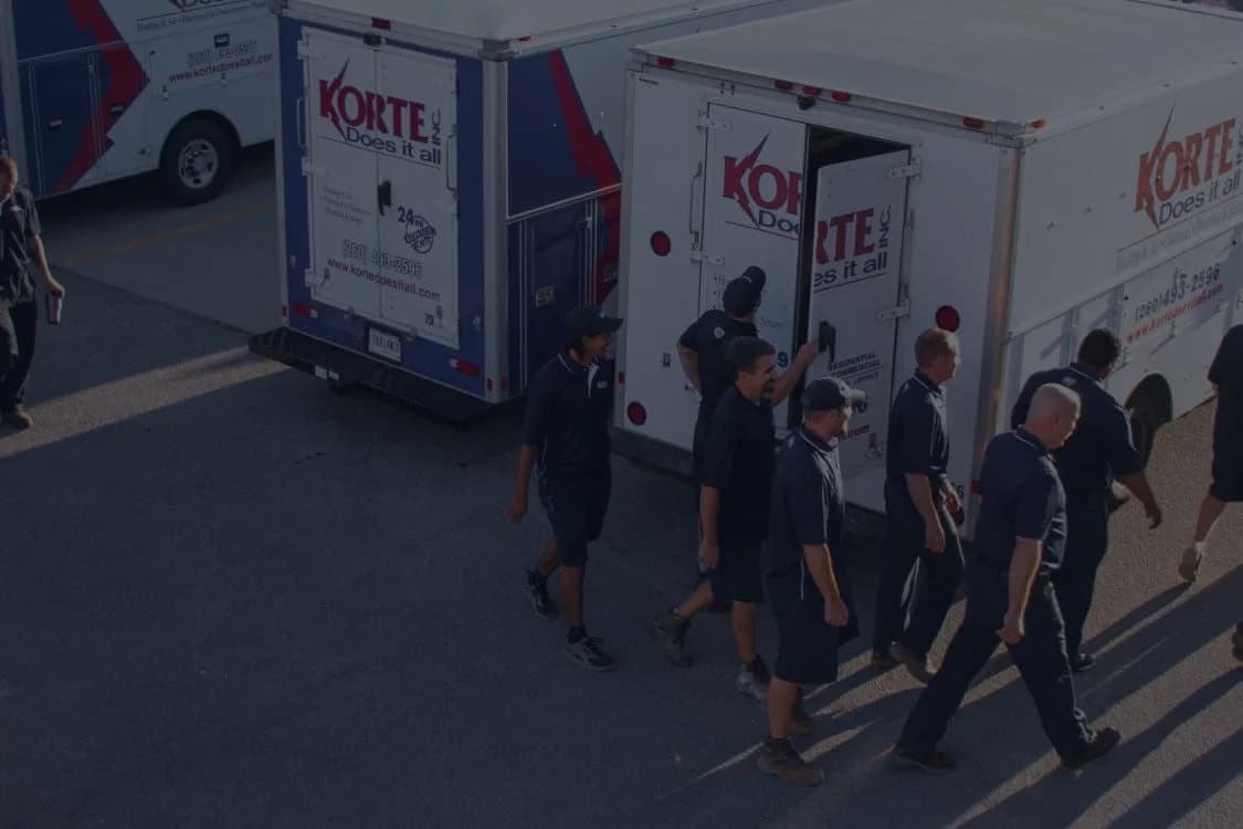 Korte Does It All banner image with trucks and employees