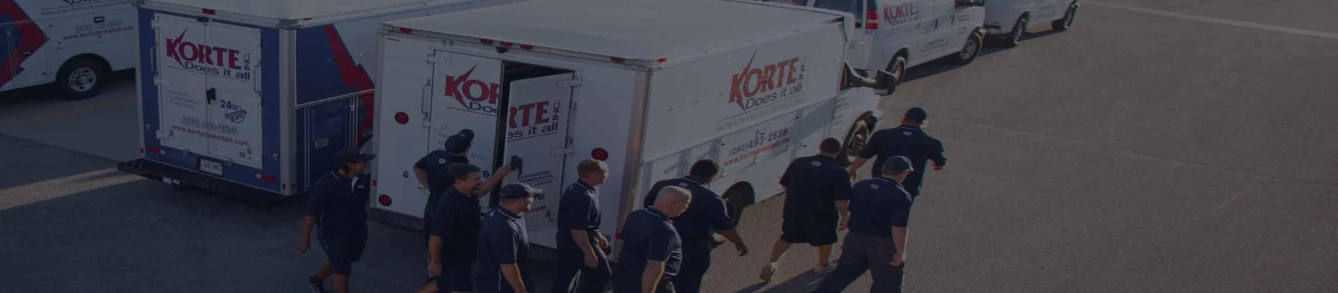 Korte Does It All banner image with trucks and employees