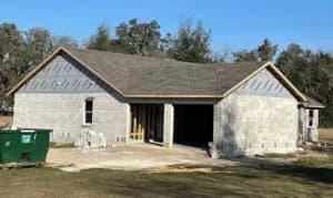 Newly constructed house with unfinished exterior.