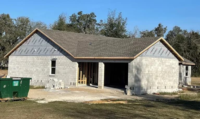 Newly constructed house with unfinished exterior.