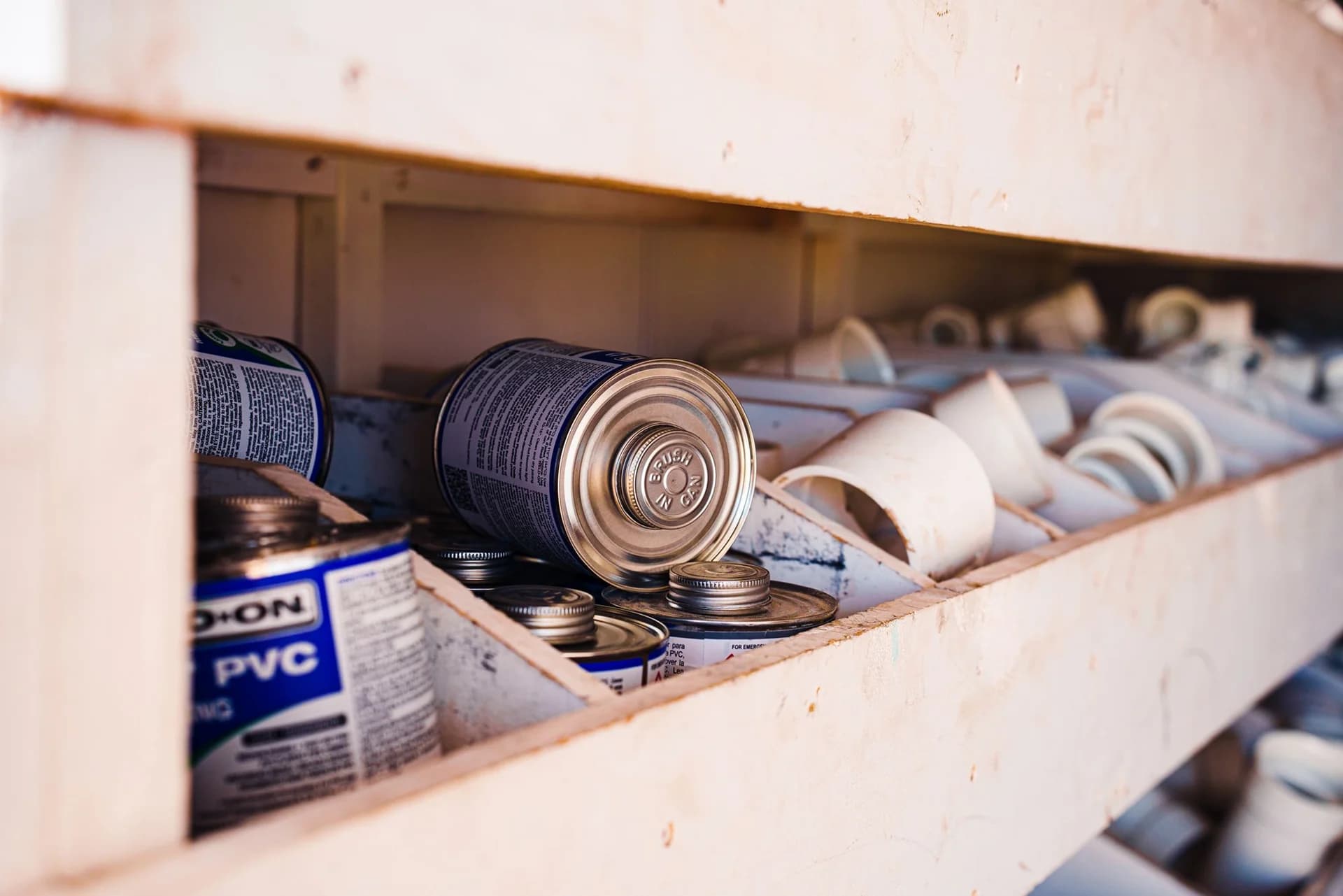 PVC glue and spare plumbing parts in Dynamic Plumbing trailer