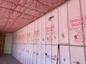 Fiberglass batt Insulation installed in an interior wall and ceiling.