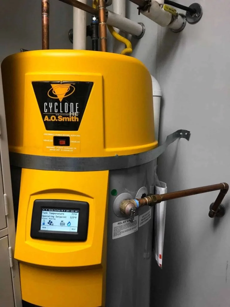 Hot water heater by A.O. Smith, featuring a yellow exterior and digital display, representing Nespolo Mechanical's hot water heater replacement services in Bernalillo, NM.