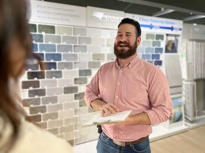 Vision Flooring Designer John Laughing with Clients Shopping for New Floors